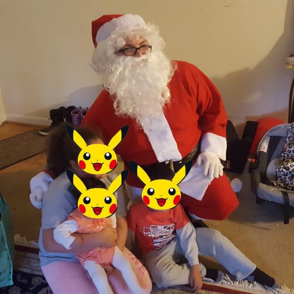 Matt delivering gifts as Santa